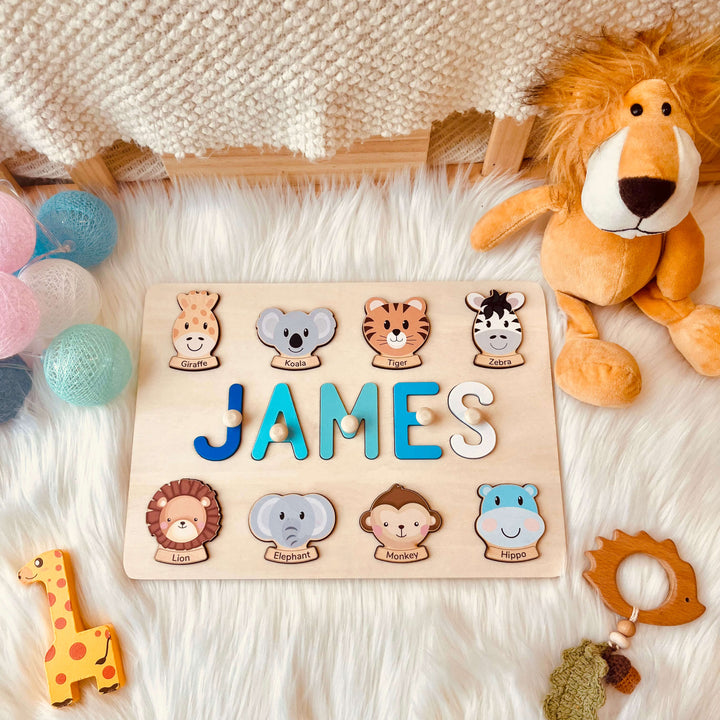 Wooden name puzzle with elemental names - “JAMES”