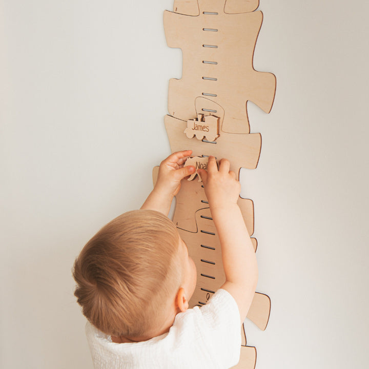 Personalized Baby Height Growth Chart Ruler Nursery Decor and a kid