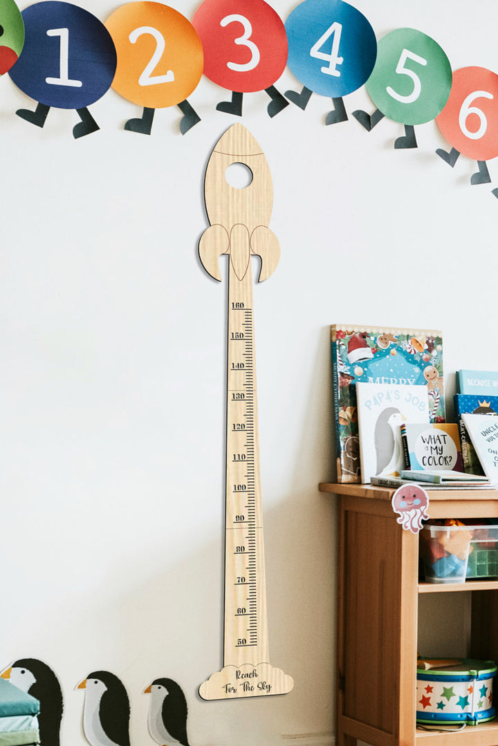 Wooden Baby Rocket Growth Chart on the Wall