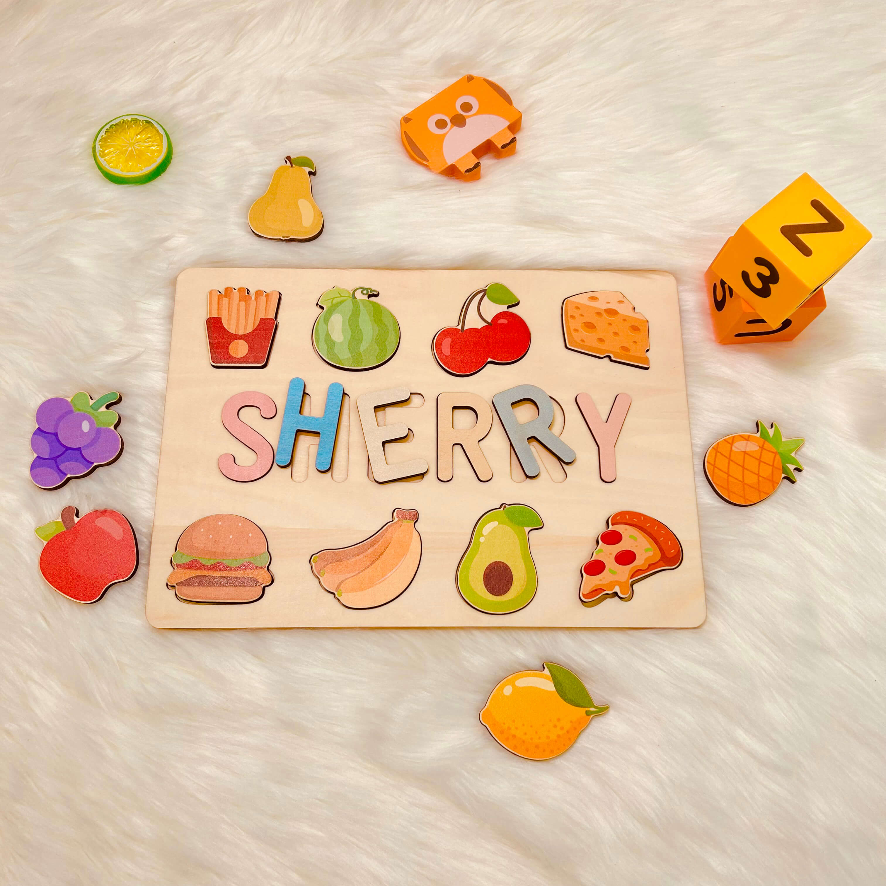Personalized Wooden Baby Name Puzzle with Food Product Name: Personalized Wooden Baby Name Puzzle with Food Material: Eco-Friendly Plywood BasswoodLetters Available: Up to 10Engraving Messages: AvailableNon-Toxic: YesNon-Harmful: Yes Color: Pastel-boy; Pa