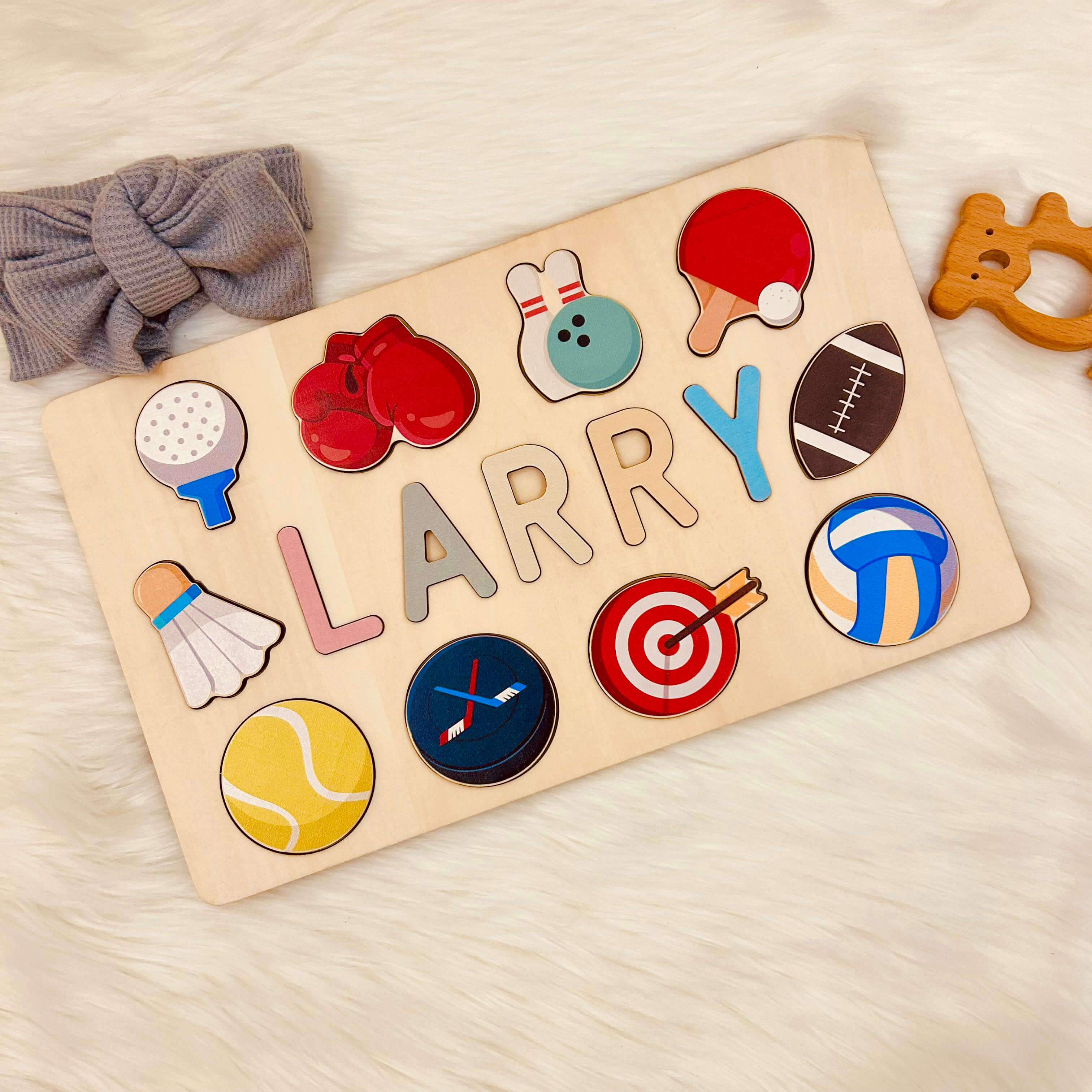 Personalized Wooden Baby Name Puzzle with Balls Product Name: Personalized Wooden Baby Name Puzzle with Balls Material: Eco-Friendly Plywood BasswoodLetters Available: Up to 10Engraving Messages: AvailableNon-Toxic: YesNon-Harmful: Yes Color: Pastel-boy;