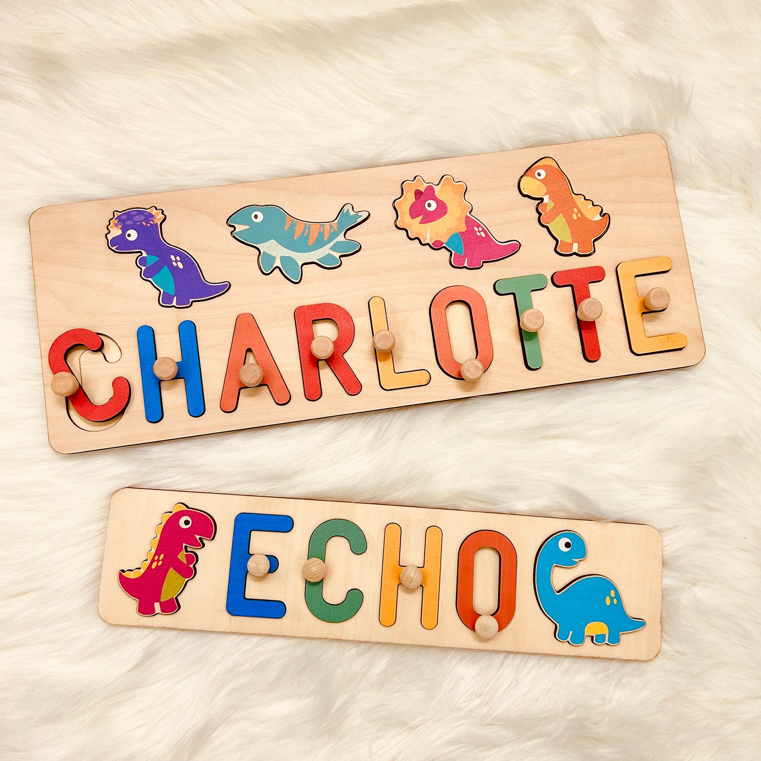 Personalized Wooden Baby Name Puzzle - Dinosaurs Product Name: Personalized Wooden Name Puzzle - DinosaursMaterial: Eco-Friendly Plywood BasswoodLetters Available: Up to 8Engraving Messages: AvailableNon-Toxic: YesNon-Harmful: Yes Our bestselling Name Puz